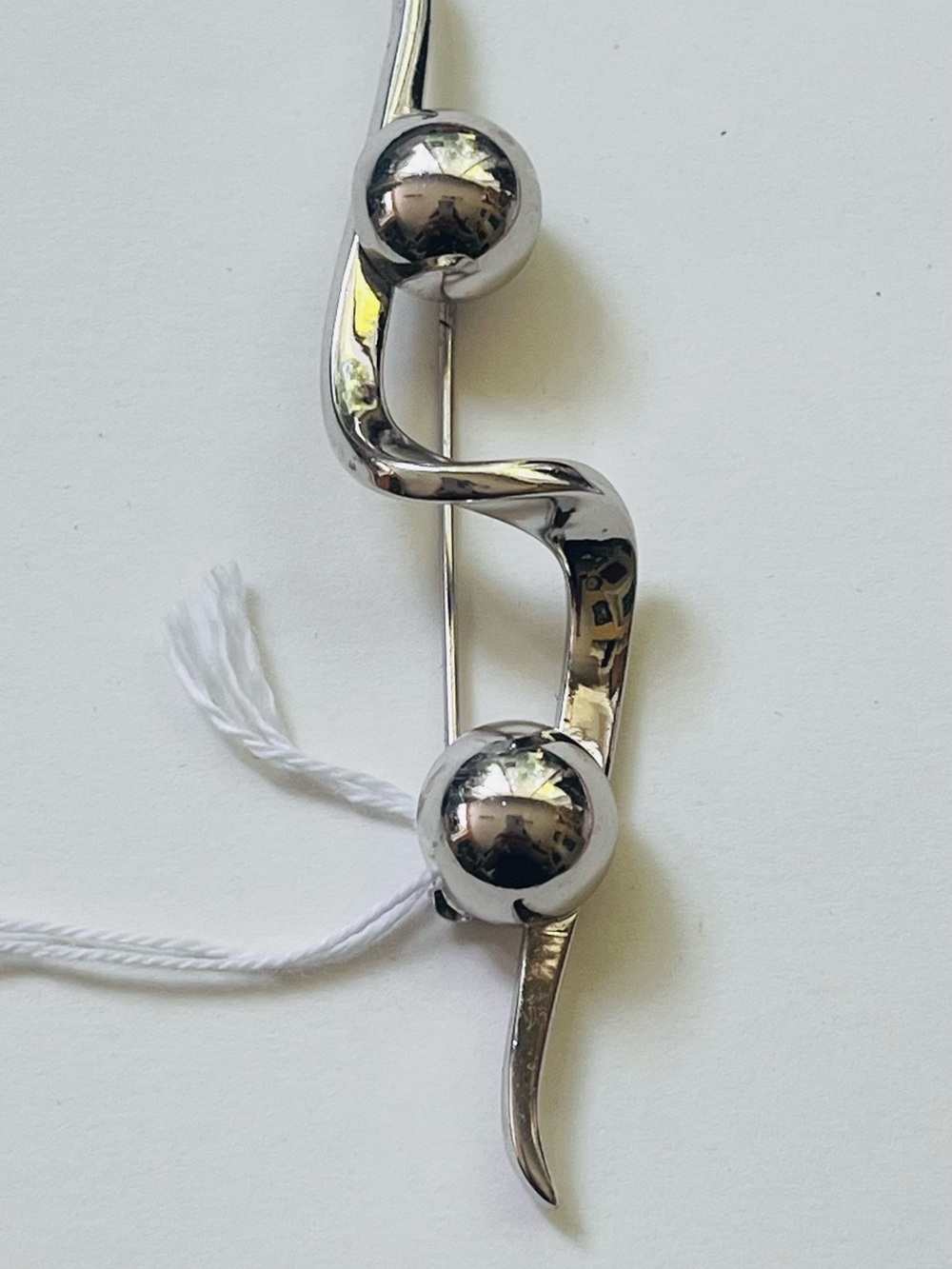 Silver-Tone Sculptural Brooch with Polished Spheres
